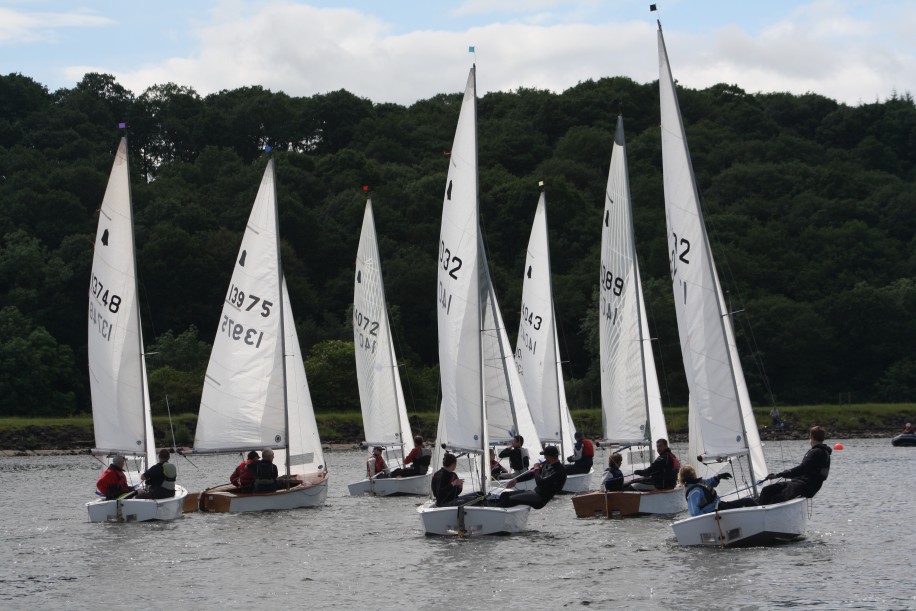 A group of GP14s start a race